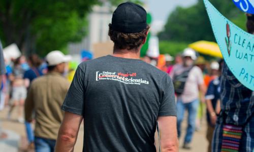 The back of a Union of Concerned Scientists shirt where the word "concerned" is crossed out and replaced with "pissed-off".