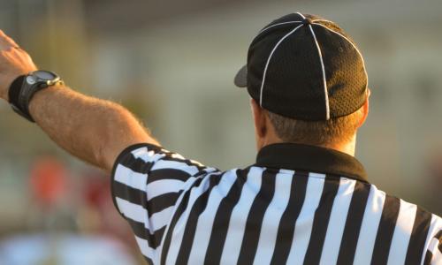 A referee pointing.